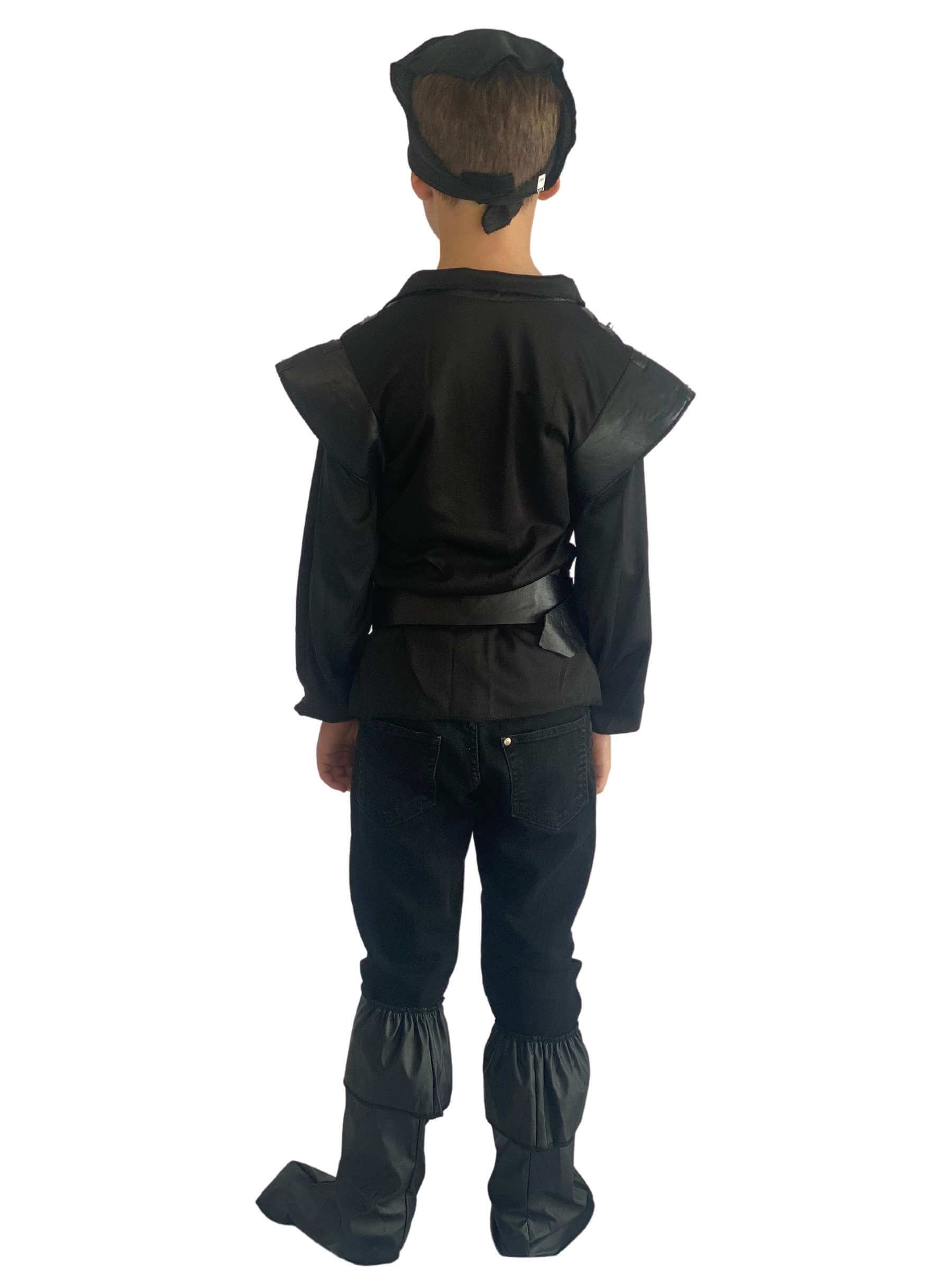 The back of a boy wearing a back pirate costume.