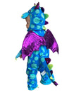 Back of a child wearing blue and green spotty dragon costume showing the purple wings and blue tail with purple and green scales.