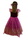 The back of the girl in the plum dress showing the flower detail to the headband.