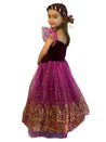 Side of the girl wearing the plum coloured dress showing the gold glittered detail to the skirt.