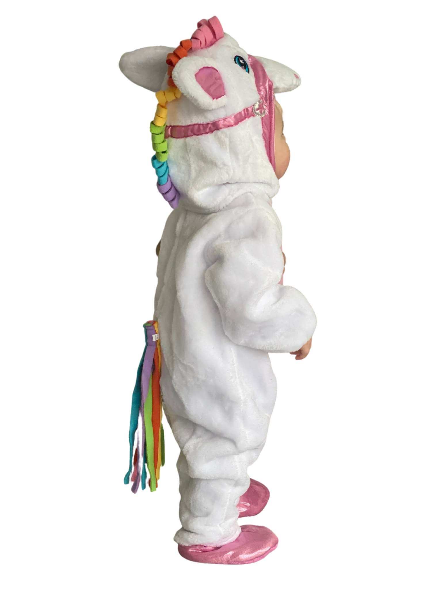 Side of the toddler wearing the unicorn costume.