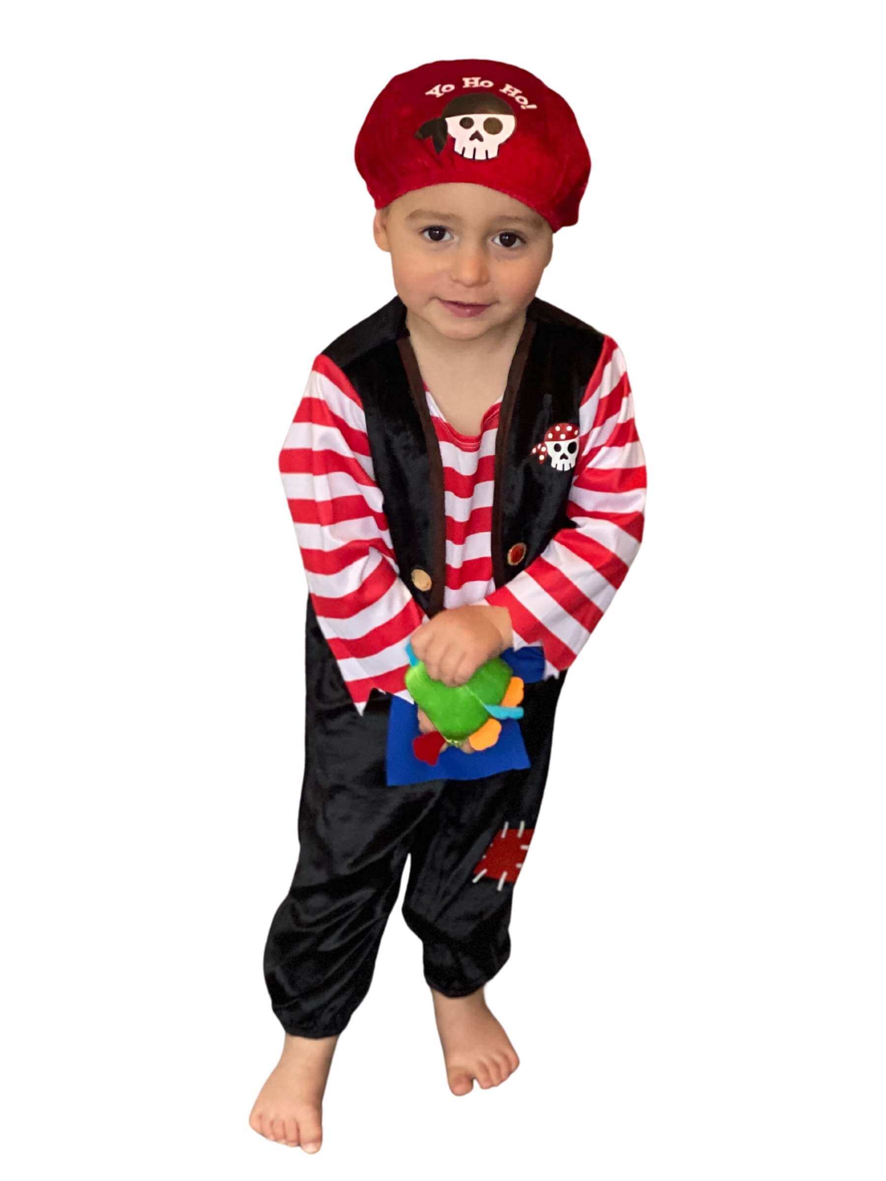 Toddler wearing pirate onesie with black waistcoat and bandana saying Yo Ho Ho!