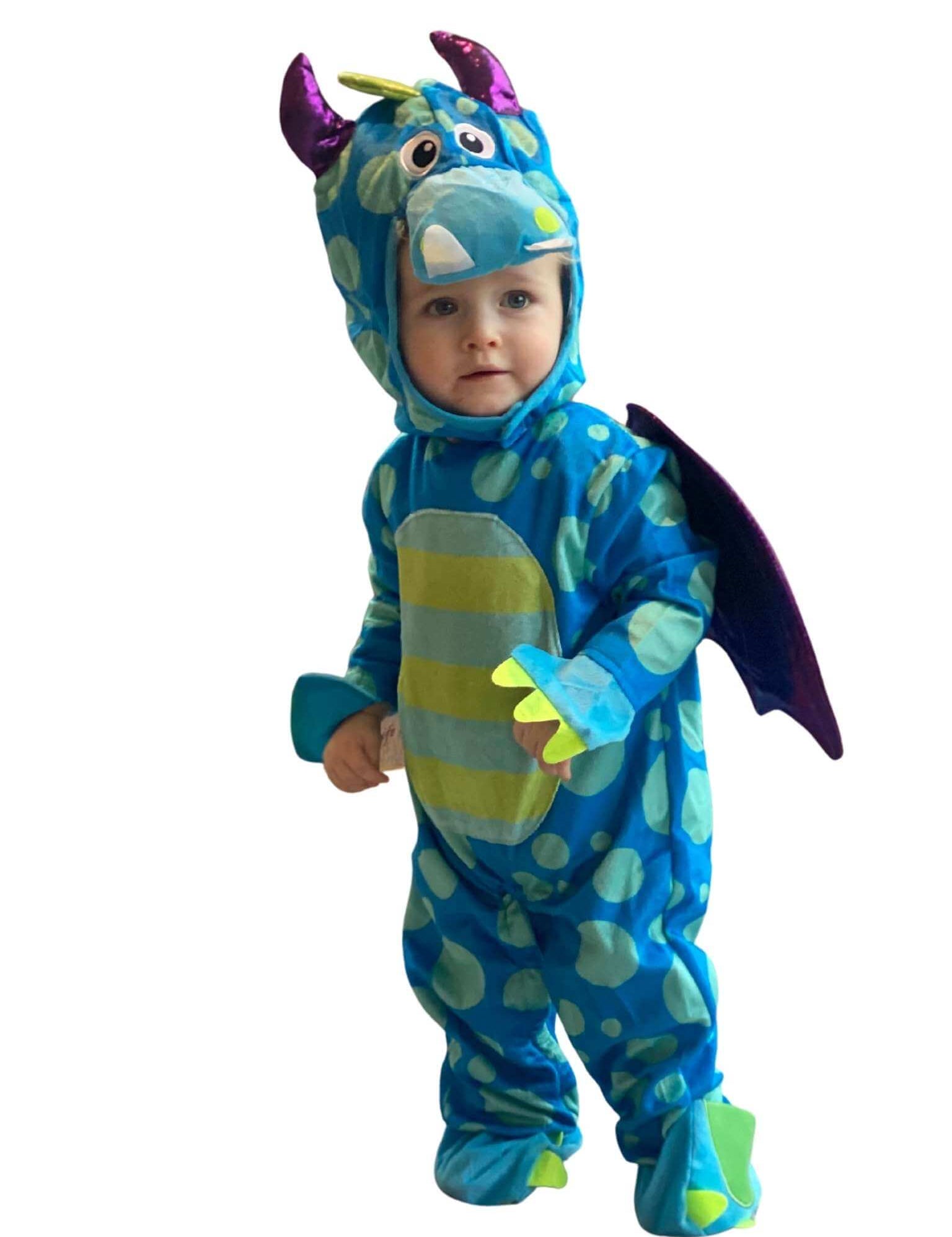 Toddler wearing blue and green dragon costume showing the padded dragon face hood and striped tummy.