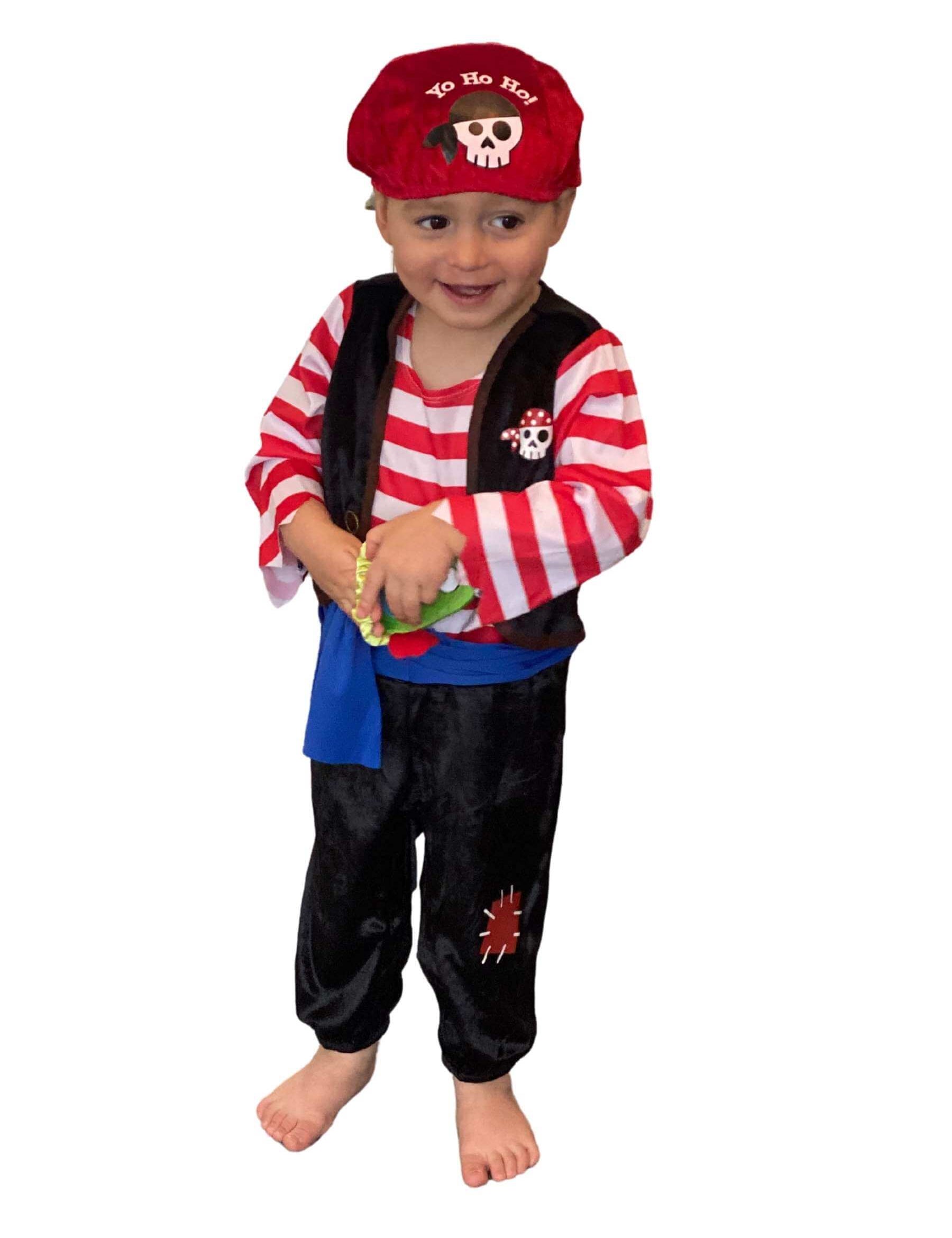 Toddler wearing pirate onesie with red bandana saying Yo Ho Ho!