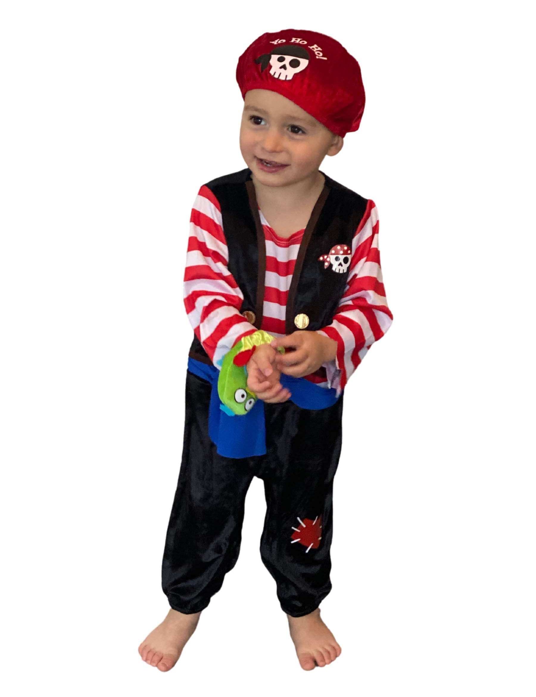 Smiling toddler wearing pirate onesie.